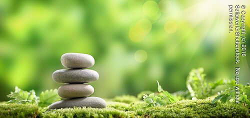 Stack,Of,Zen,Stones,On,Nature,Background Stack of zen stones on nature background
